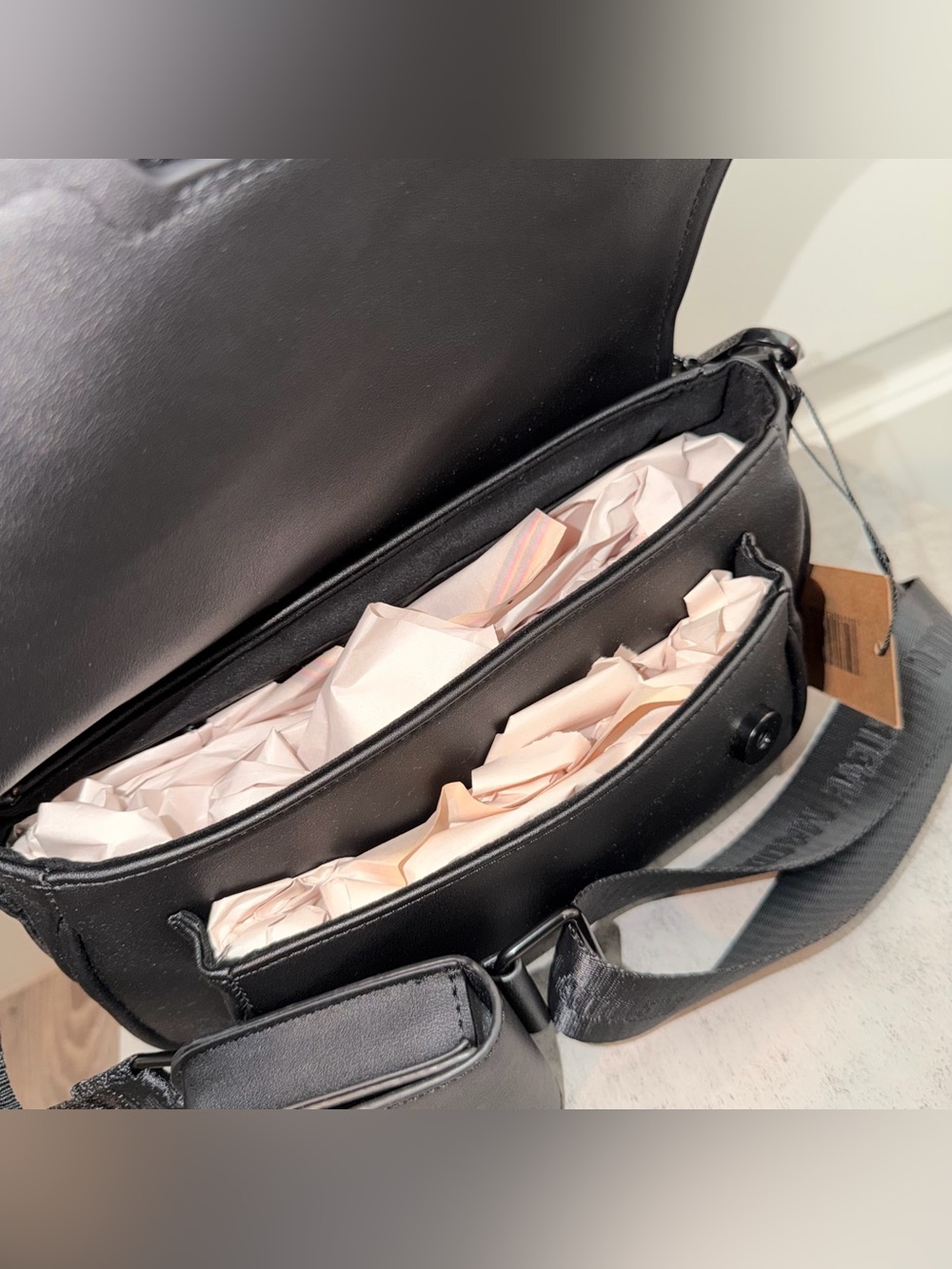 Black Steve Madden Bcharle crossbody bag with a prominent buckled strap detail - Picture 2 of 4